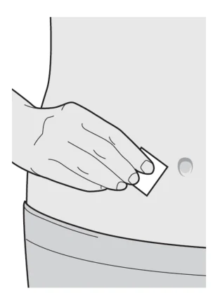 A person's hand holding a piece of paper on a stomach
AI-generated content may be incorrect.