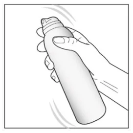 A close-up of a hand holding a spray can

Description automatically generated